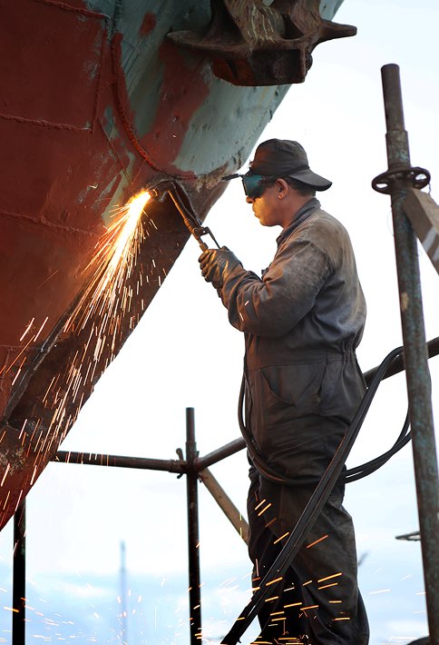 A welder working and a shower of sparks